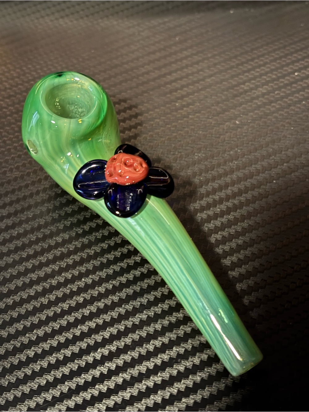 Green Handheld Glass with Flower Accent